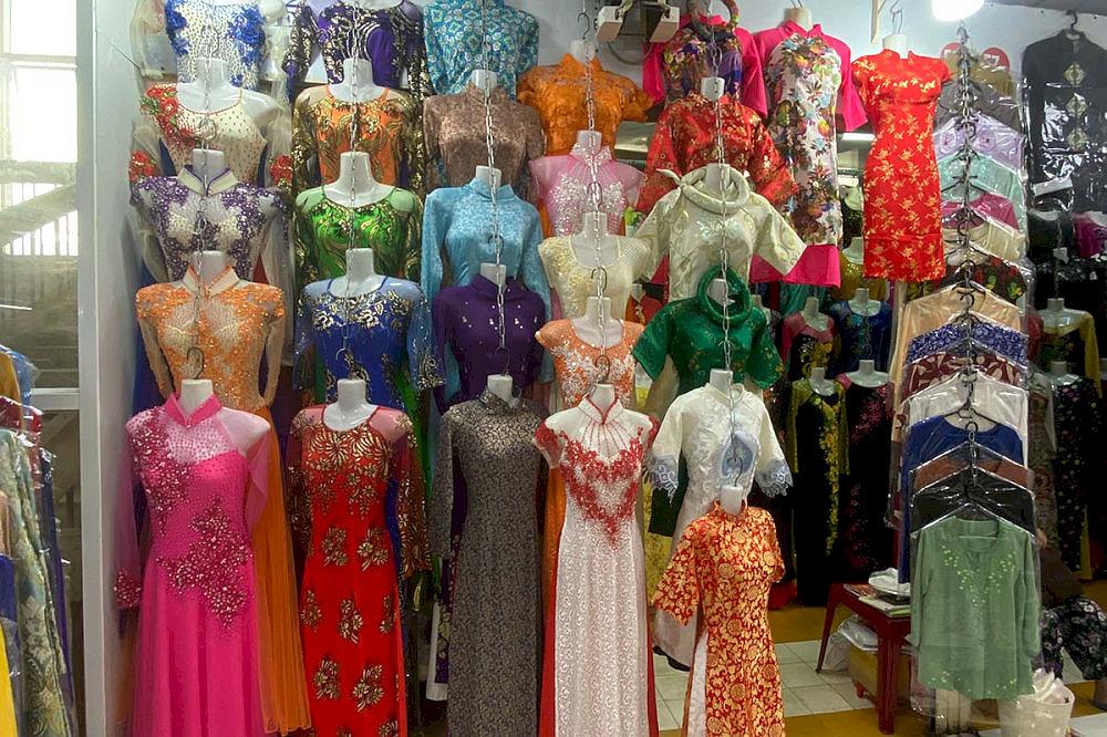 Colorful fabrics and ao dai neatly stacked